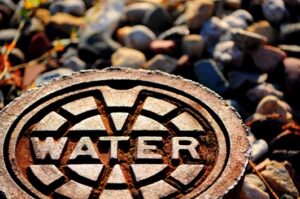 manhole cover labeled water